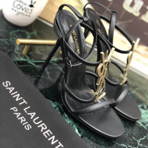 CASSANDRA FLAT SANDALS IN CROCODILE-EMBOSSED LEATHER WITH GOLD-TONE MONOGRAM